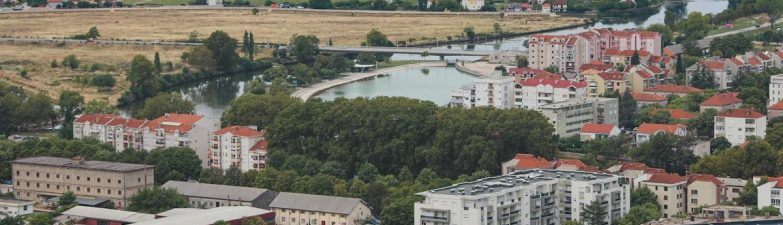a view of a city with a river running through it